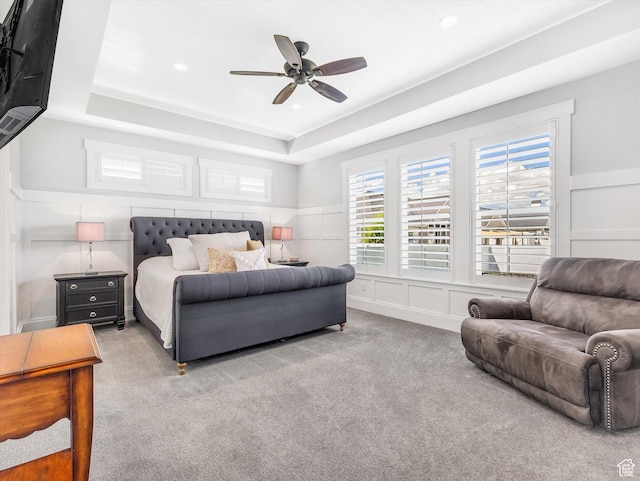 11896 S Verde View Cv, Riverton, UT 84065 - bedroom with a decorative wall, carpet, wainscoting, a tray ceiling, and ceiling fan