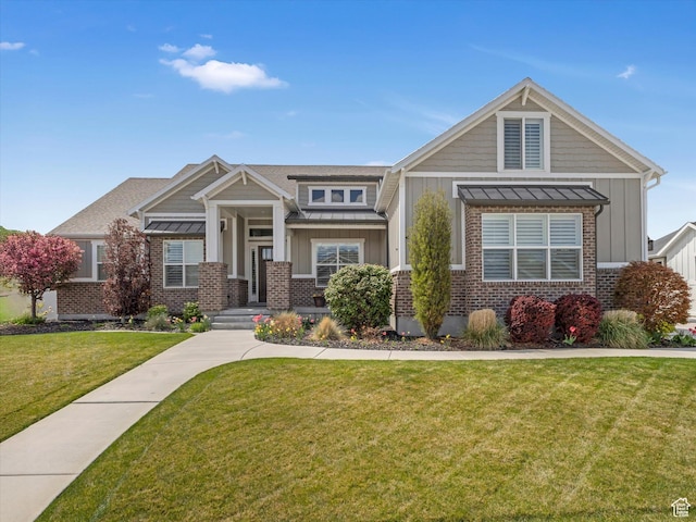 11896 S Verde View Cv, Riverton, UT 84065 - craftsman-style house featuring a standing seam roof, board and batten siding, and brick siding