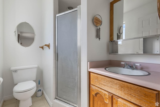 133 N Lakeview W Unit 39, Stansbury Park, UT 84074 - bathroom with a sink, a stall shower, toilet, and baseboards