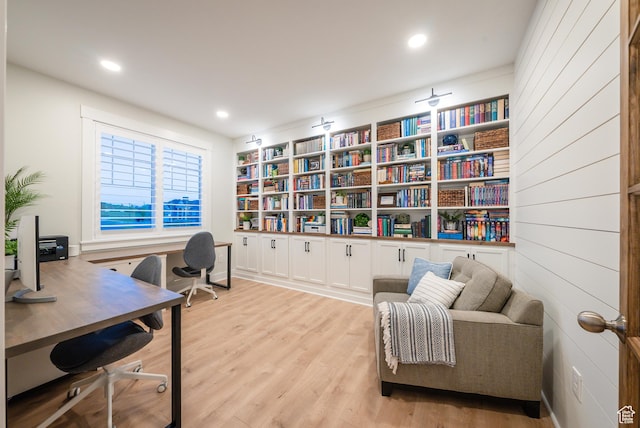 office space featuring light wood-style floors and recessed lighting