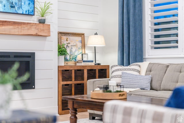 living area featuring a fireplace