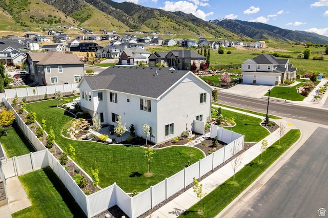 aerial perspective of suburban area with mountains