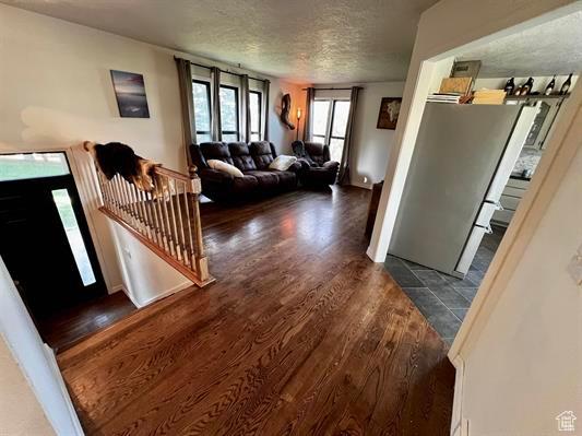 1204 Nashua Cir, Soda Springs, ID 83276 - living area with wood finished floors and a textured ceiling