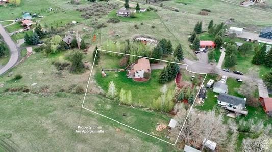 1204 Nashua Cir, Soda Springs, ID 83276 - aerial view of property and surrounding area with property parcel outlined and rural landscape