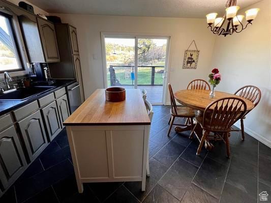 1204 Nashua Cir, Soda Springs, ID 83276 - dining space with a chandelier and baseboards