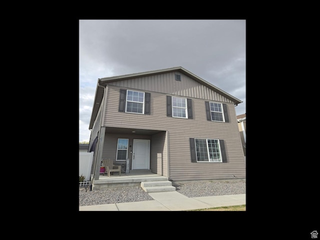 view of front of property with covered porch and board and batten siding