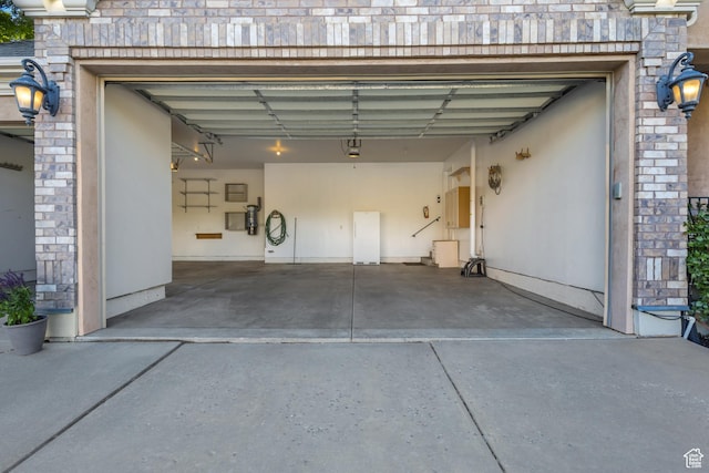 garage featuring driveway