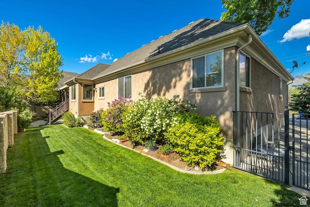back of house with stucco siding