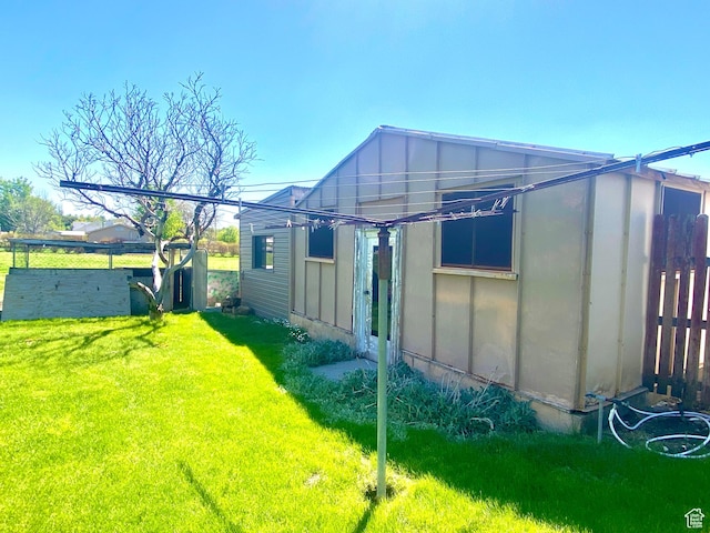 105 S 200 E, Richmond, UT 84333 - rear view of house with board and batten siding