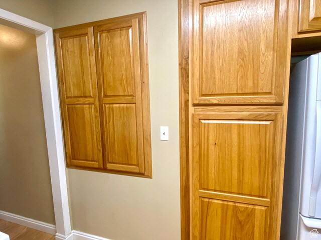 105 S 200 E, Richmond, UT 84333 - detailed view of white fridge and baseboards