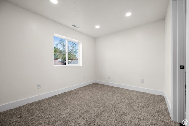850 E Village Rd N, Ogden, UT 84404 - spare room with carpet floors, recessed lighting, and baseboards