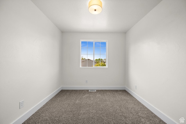 850 E Village Rd N, Ogden, UT 84404 - carpeted spare room featuring baseboards