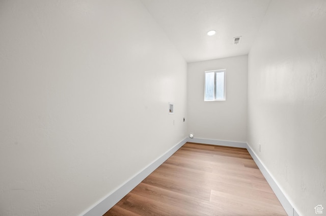850 E Village Rd N, Ogden, UT 84404 - laundry area with washer hookup, baseboards, and light wood-style flooring
