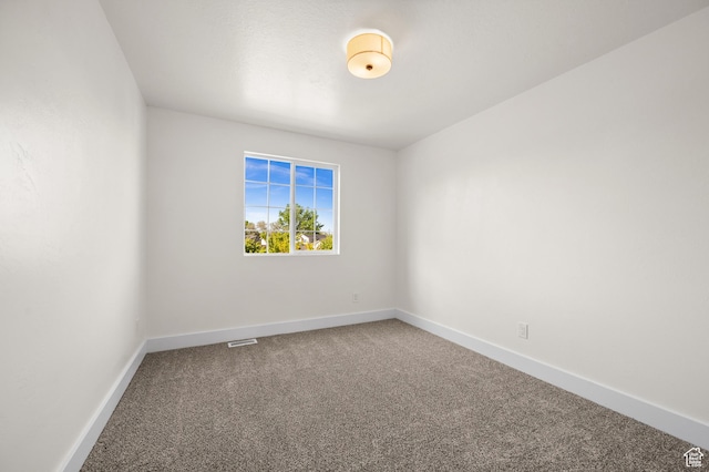 850 E Village Rd N, Ogden, UT 84404 - carpeted empty room with baseboards
