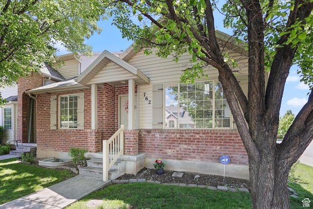 view of front of property with brick siding
