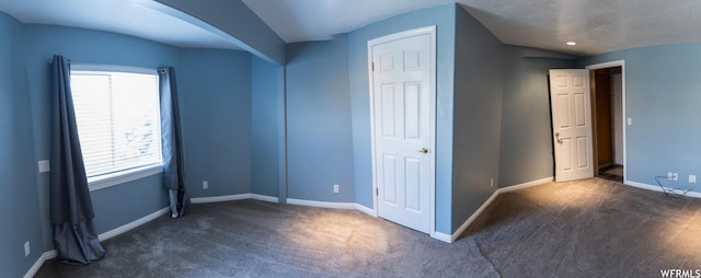 additional living space with carpet, plenty of natural light, and baseboards