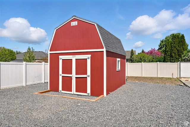 view of shed featuring a fenced backyard