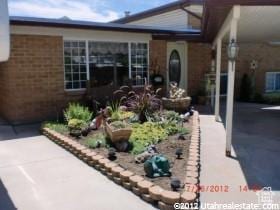 entrance to property with brick siding