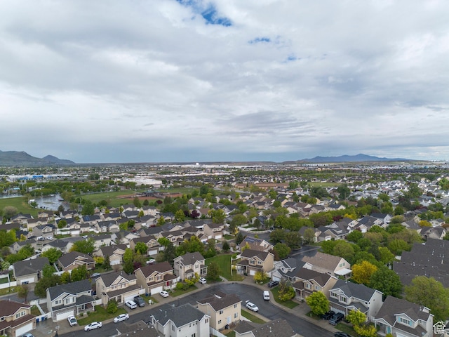 aerial view of residential area with mountains