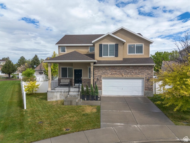 view of front of property with stone siding, stucco siding, driveway, and a front lawn