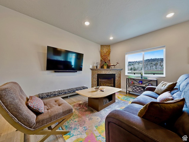 310 N N Hwy Unit 22A, Brian Head, UT 84719 - living area featuring recessed lighting, a fireplace, and wood finished floors