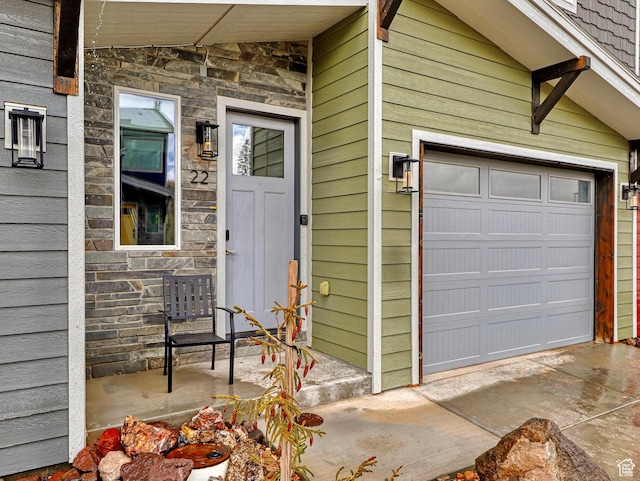 310 N N Hwy Unit 22A, Brian Head, UT 84719 - doorway to property featuring stone siding and a garage
