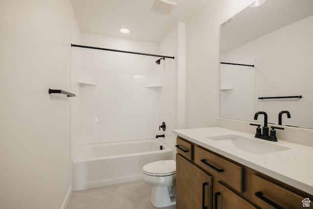 bathroom featuring toilet, tile patterned flooring, vanity, and shower / bathtub combination