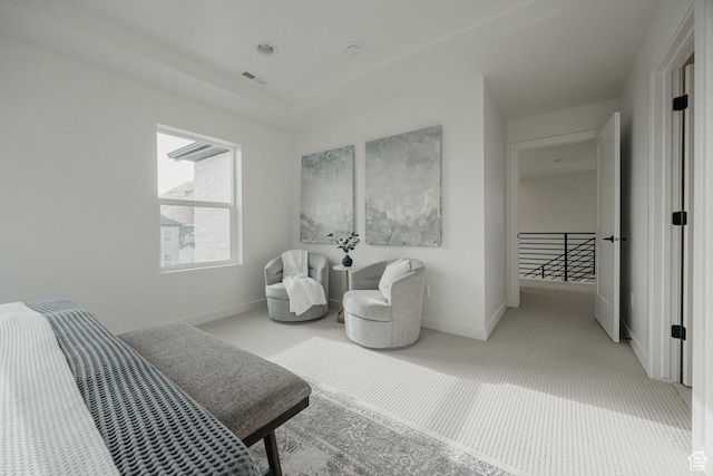carpeted bedroom featuring baseboards