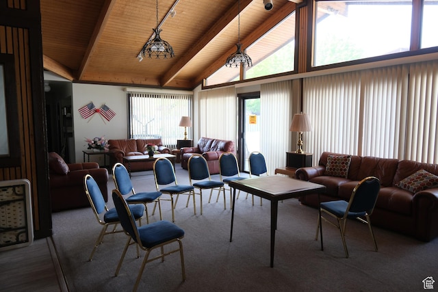 carpeted living room with wood ceiling, beamed ceiling, and high vaulted ceiling