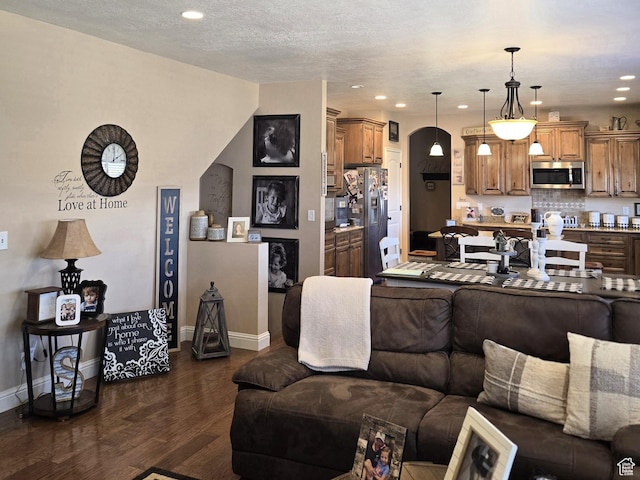 1256 Jefferson Cir, Price, UT 84501 - living room with dark wood-style floors, recessed lighting, and baseboards