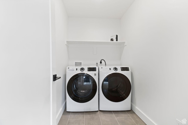 705 N Brooke Ave, Tooele, UT 84074 - washroom with washer and dryer, baseboards, and light tile patterned floors