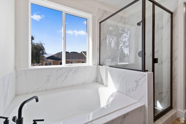705 N Brooke Ave, Tooele, UT 84074 - full bath with a marble finish shower and a garden tub