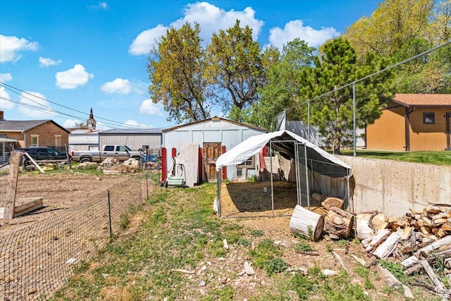 193 S Main E, Manti, UT 84642 - view of yard featuring exterior structure, fence, and an outbuilding