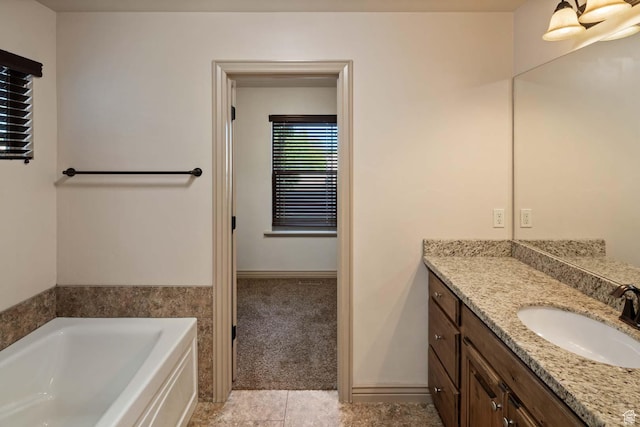 384 N 710 E, Salem, UT 84653 - full bath featuring vanity, a garden tub, and tile patterned floors