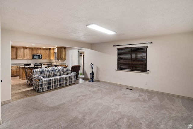 384 N 710 E, Salem, UT 84653 - living area featuring light carpet, baseboards, and a textured ceiling