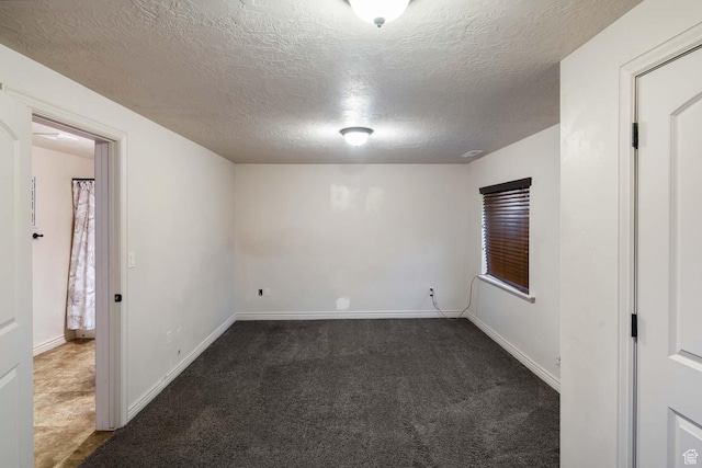 384 N 710 E, Salem, UT 84653 - unfurnished room with a textured ceiling, dark colored carpet, and baseboards