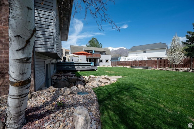 view of yard featuring a deck