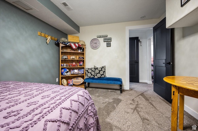 carpeted bedroom featuring baseboards