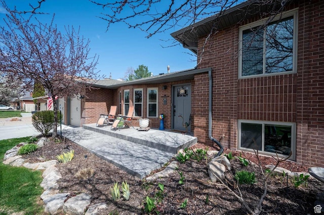 view of front of house with brick siding