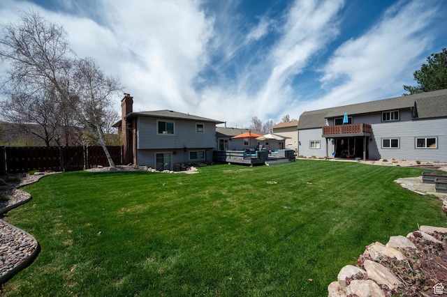 view of yard with a deck