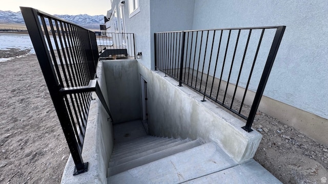 stairway featuring a mountain view
