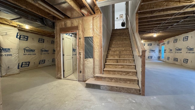 stairs with concrete floors