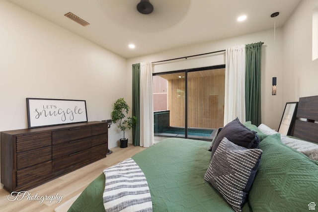 3195 S Tallow Tree Dr, St George, UT 84790 - bedroom featuring light wood-type flooring, access to exterior, and recessed lighting