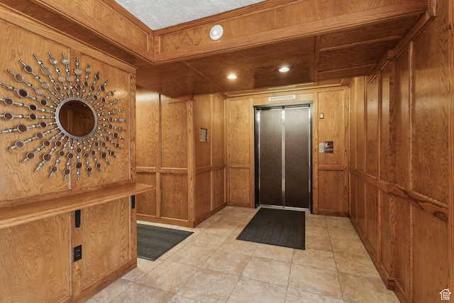 131 E 1st Ave N Unit 305, Salt Lake City, UT 84103 - foyer featuring elevator and wood walls