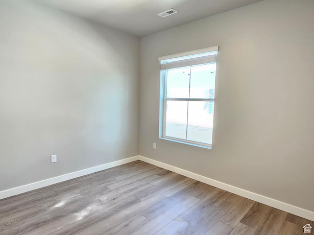 3782 S 4250 W Unit 432B, West Haven, UT 84401 - empty room featuring plenty of natural light, baseboards, and wood finished floors
