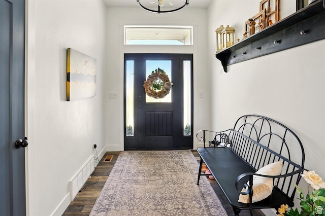 114 E 9500 S, Paradise, UT 84328 - entryway featuring dark wood-style flooring and baseboards