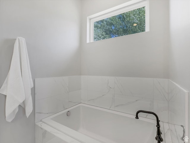 full bathroom with a bath