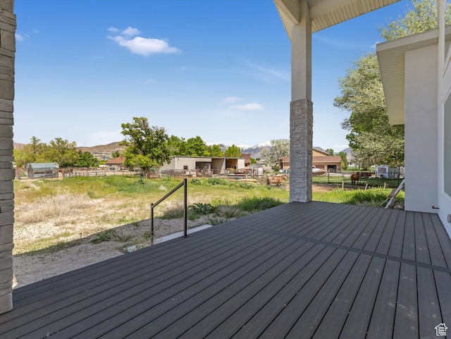 wooden terrace featuring a mountain view