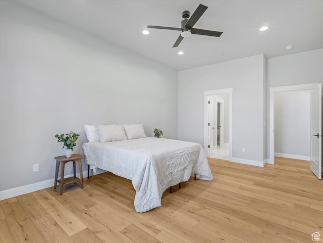 bedroom featuring light wood-style floors, baseboards, recessed lighting, and ceiling fan