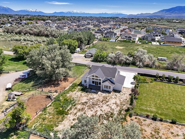 aerial view of residential area with mountains